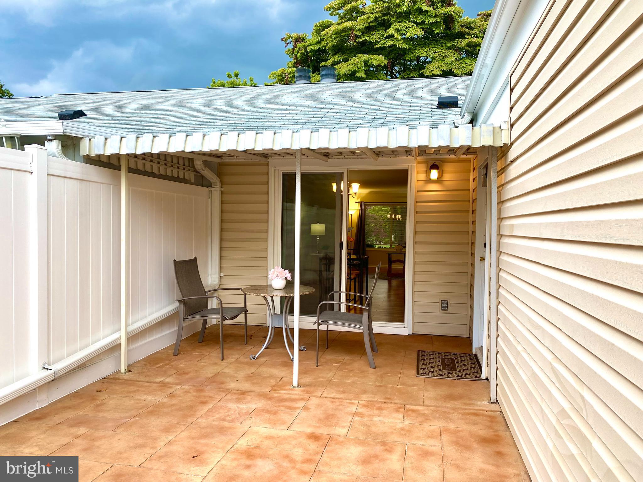 3408 Hallaton Court, Unit 165B Silver Spring, MD 20906 - Photo 26 of 40 UPGRADED SCULPTED CONCRETE PATIO, UPDATED SLIDER