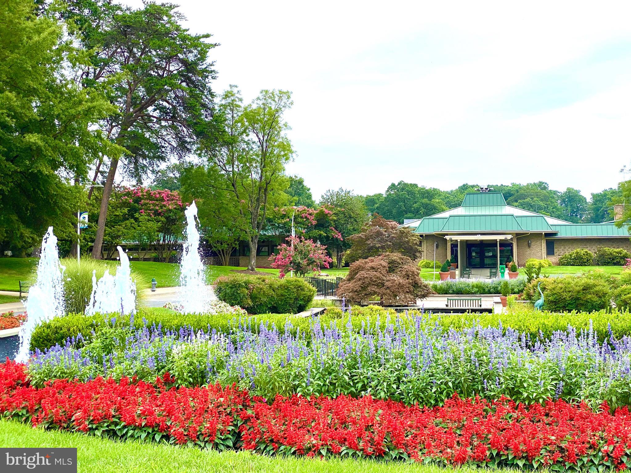 3408 Hallaton Court, Unit 165B Silver Spring, MD 20906 - Photo 32 of 40 CLUB HOUSE ONE, WELCOMING GARDENS & FOUNTAIN