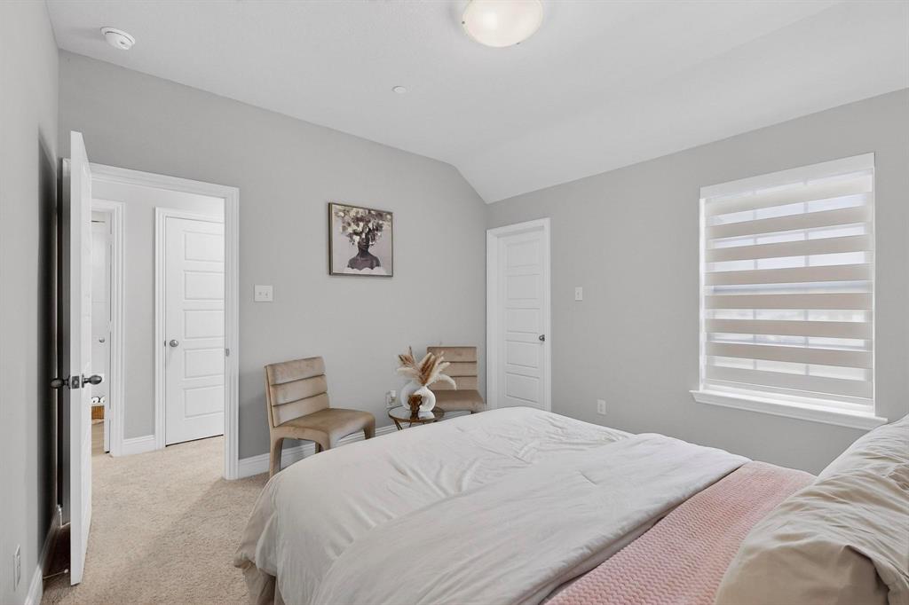 6040 Bursey Road Watauga, TX 76148 - Photo 29 of 39 A bright room featuring light gray walls, carpeted flooring, and a window with horizontal blinds