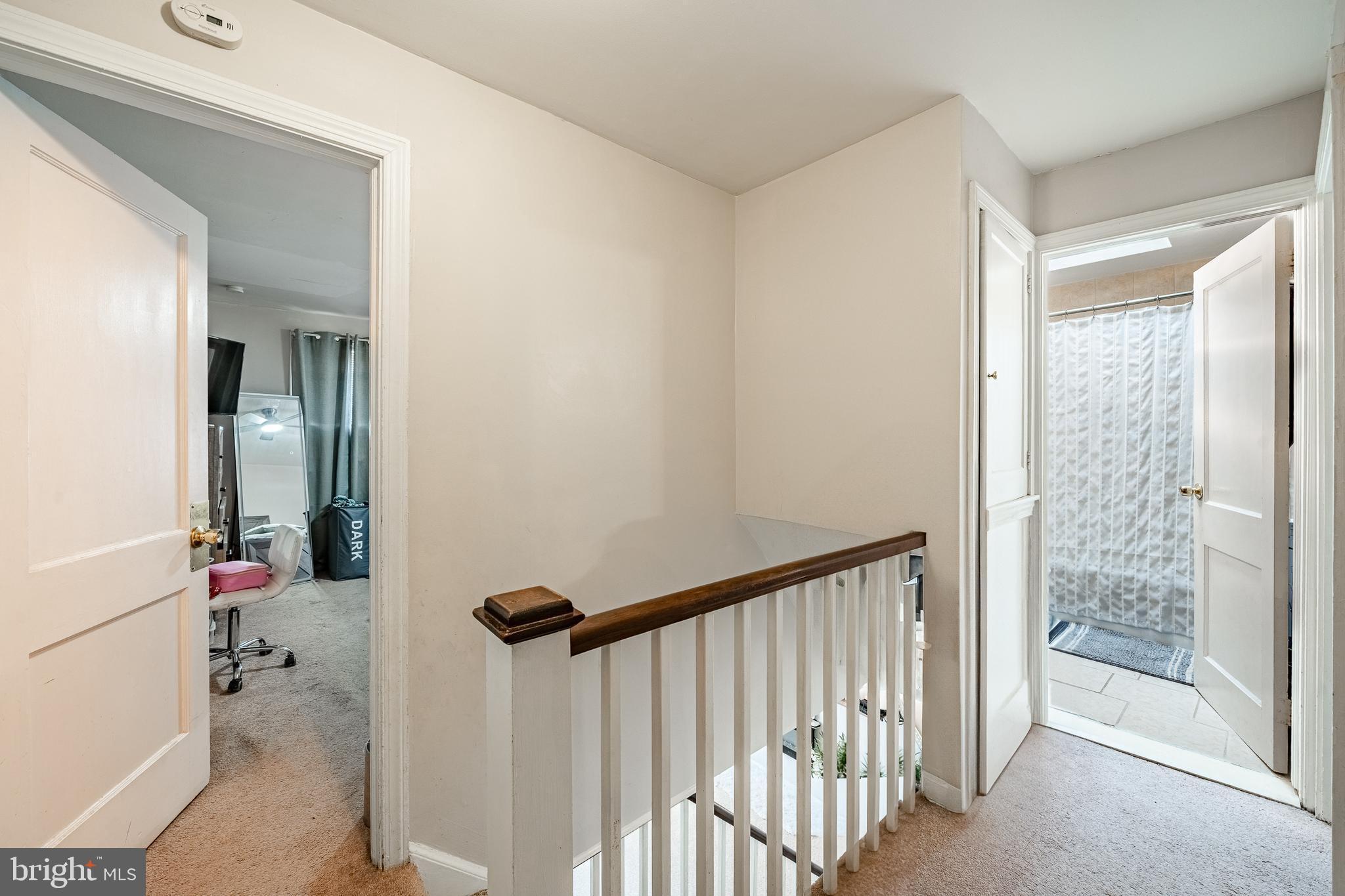 211 Wingate Road Upper Darby, PA 19082 - Photo 13 of 27 a view of a bathroom from a hallway