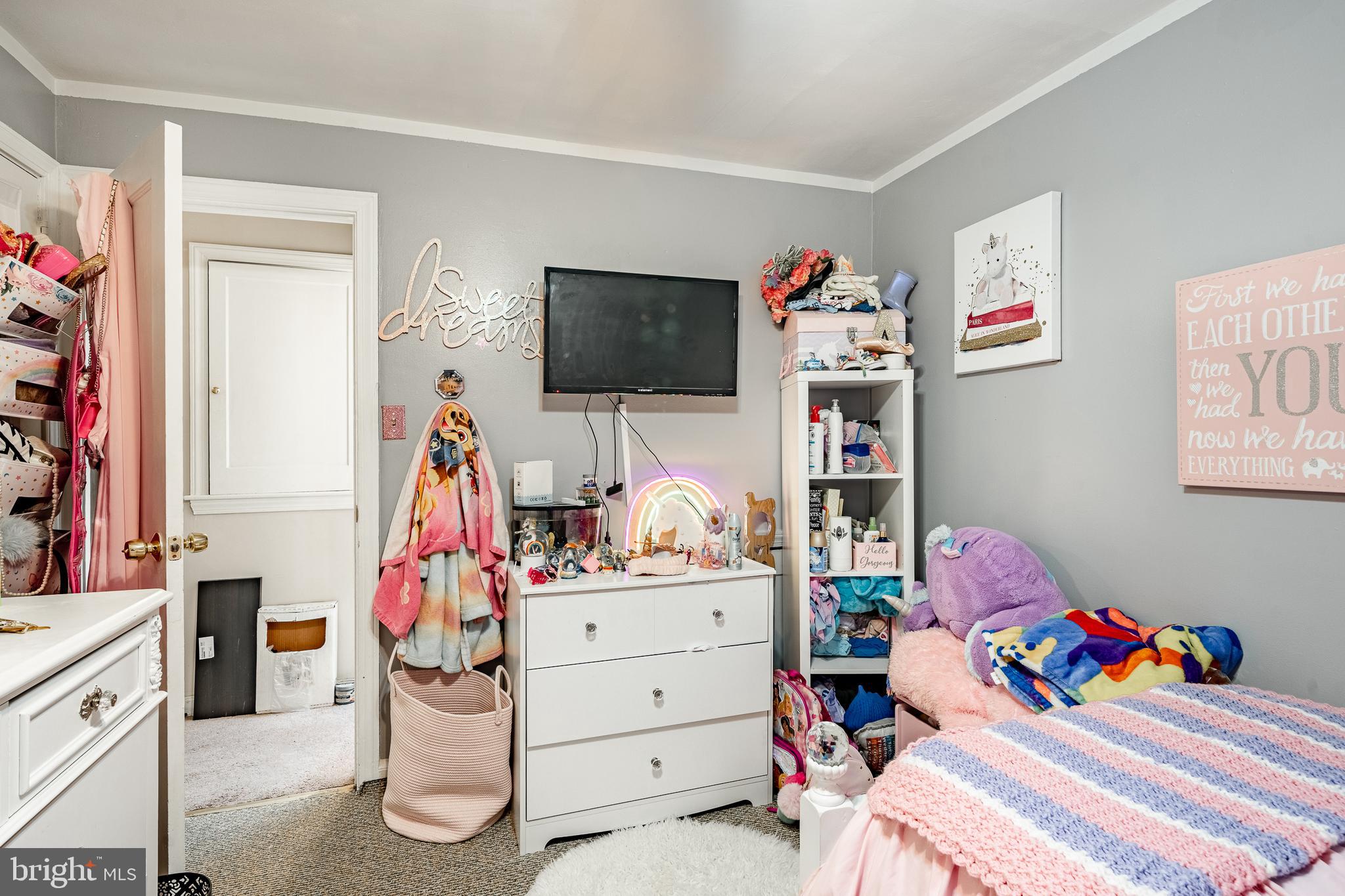 211 Wingate Road Upper Darby, PA 19082 - Photo 17 of 27 a children room with toys and a flat screen tv