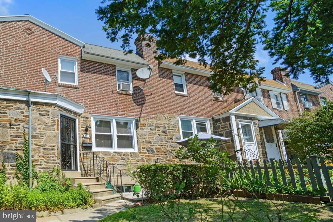 211 Wingate Road Upper Darby, PA 19082 - Photo 2 of 27 a front view of a house with plants and trees