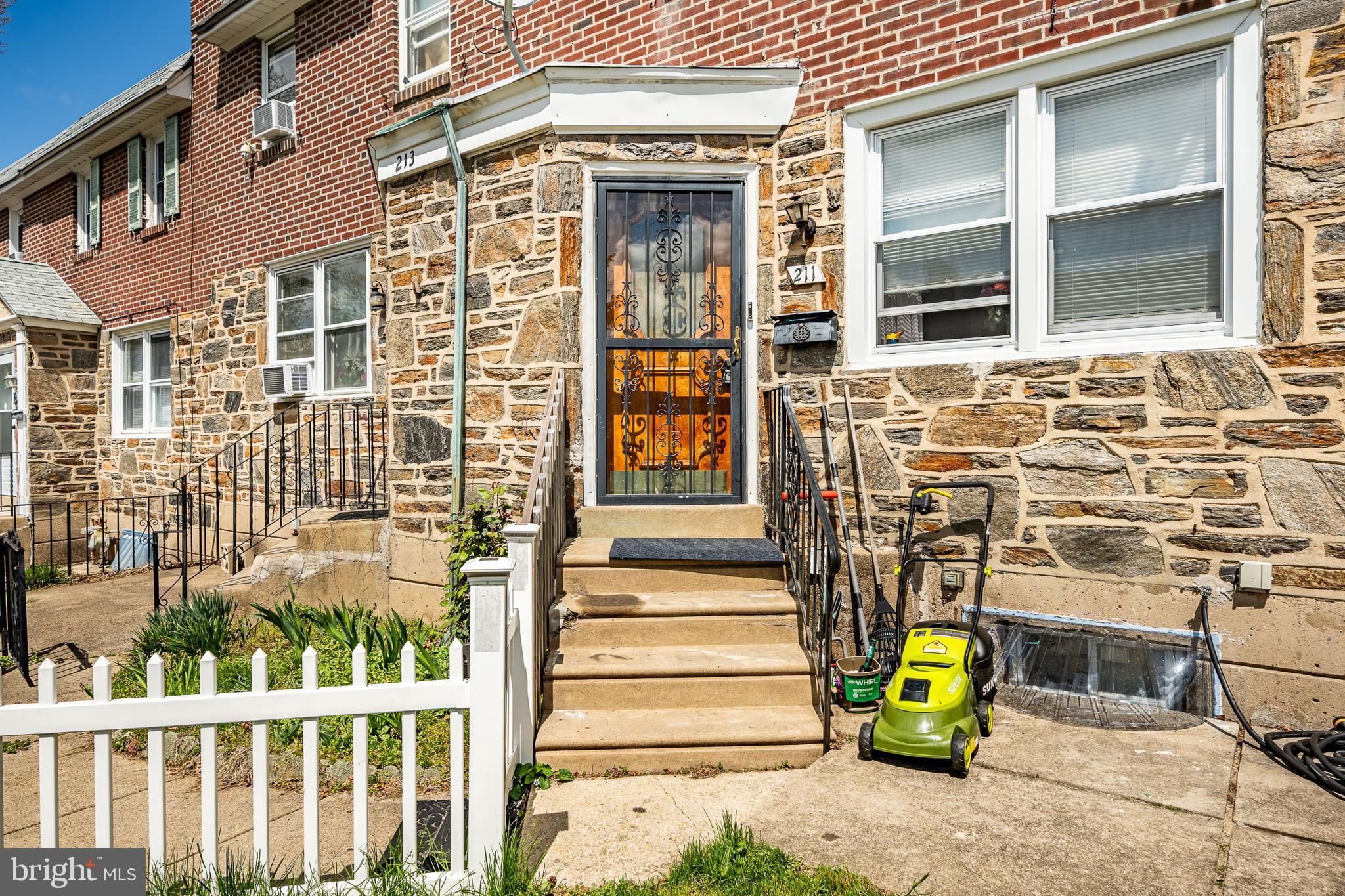 211 Wingate Road Upper Darby, PA 19082 - Photo 4 of 27 a front view of a building
