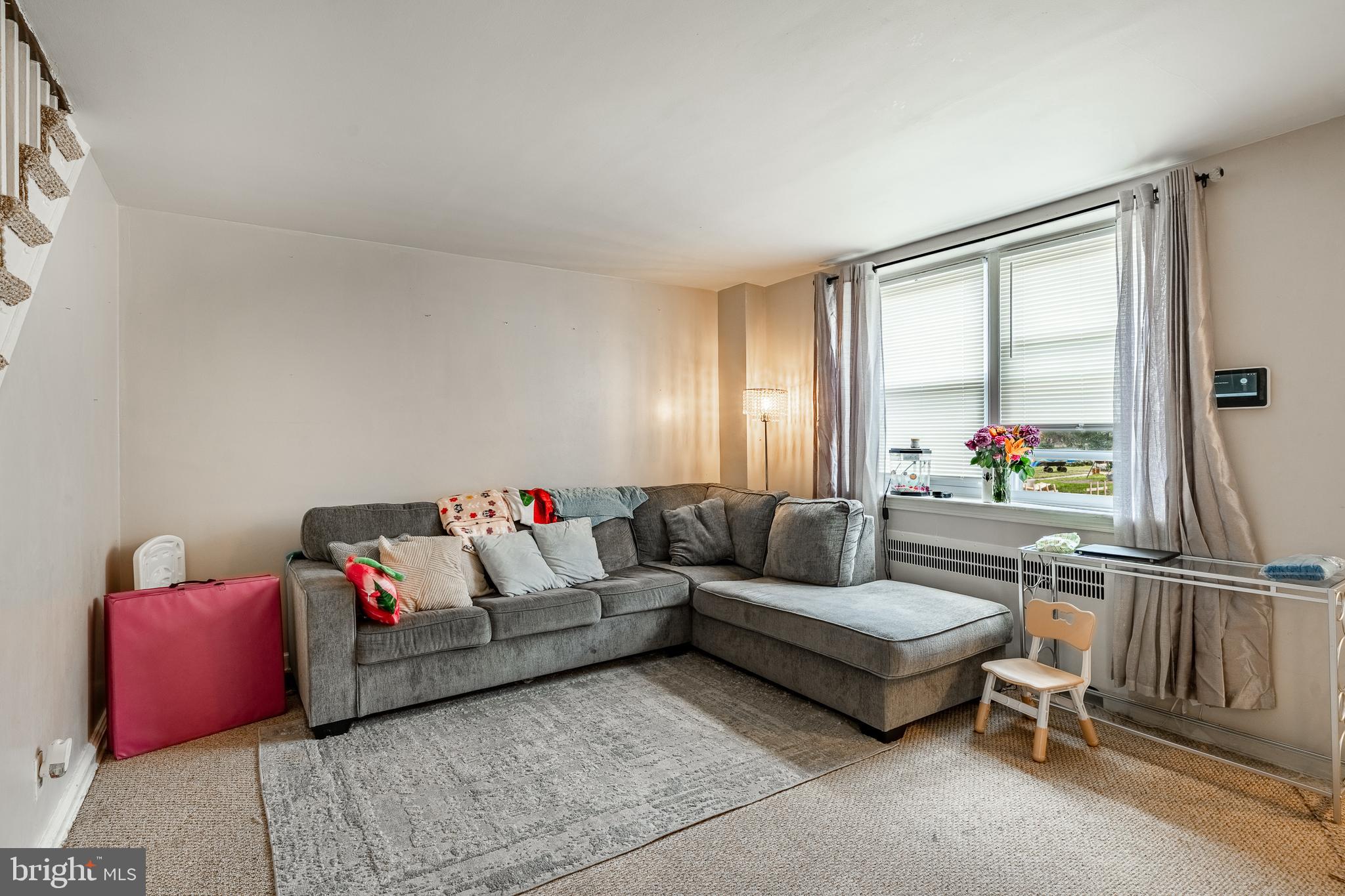 211 Wingate Road Upper Darby, PA 19082 - Photo 6 of 27 a living room with furniture and a potted plant