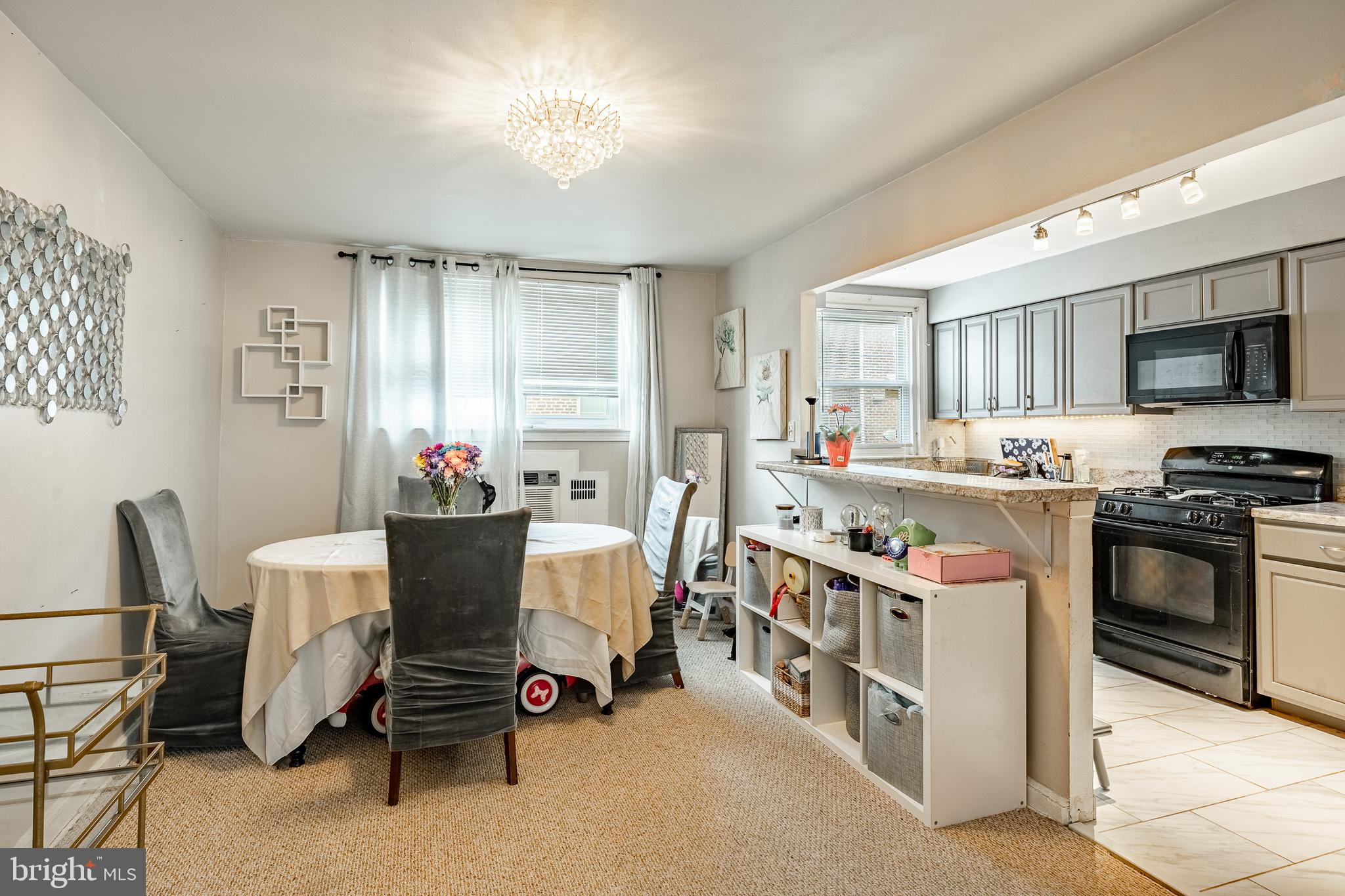 211 Wingate Road Upper Darby, PA 19082 - Photo 10 of 27 a kitchen that has a lot of cabinets in it and appliances