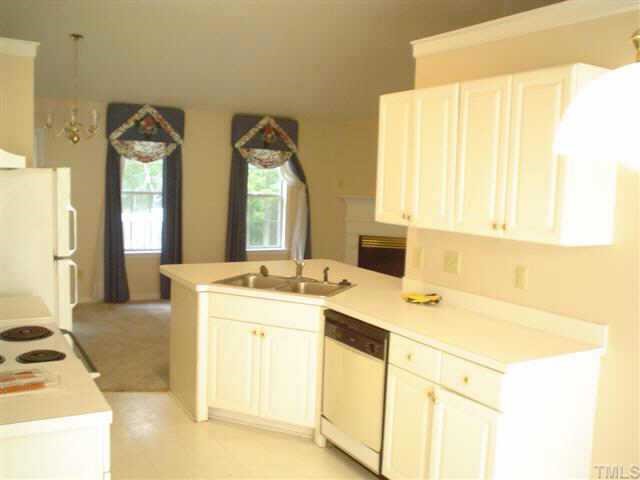 4441 Labrador Drive Raleigh, NC 27616 - Photo 3 of 3 a spacious bathroom with a sink double vanity and a mirror