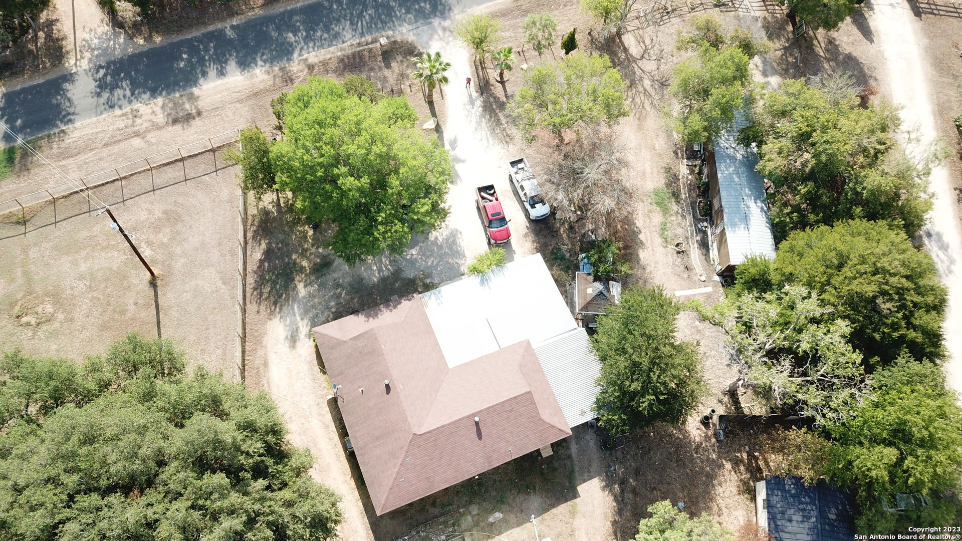 10805 Hollowell Road Atascosa, TX 78002 - Photo 21 of 25 an aerial view of house with yard