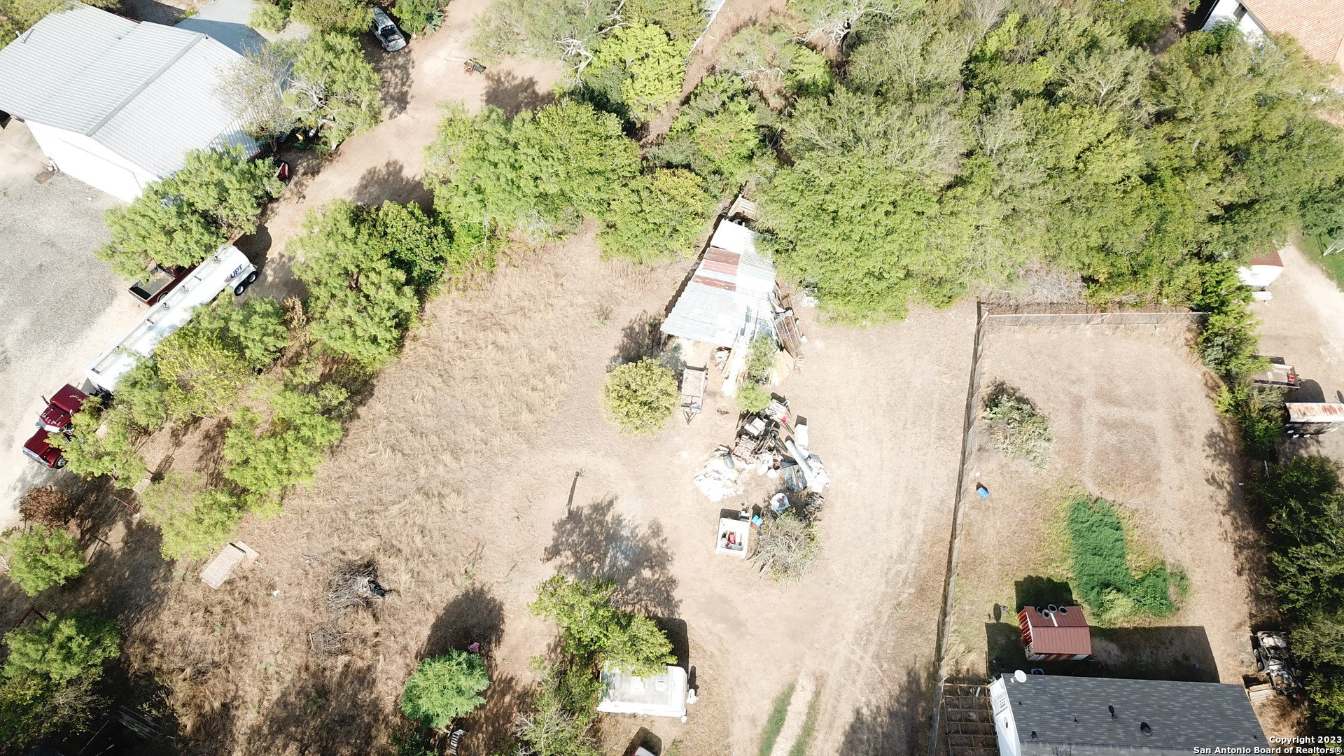 10805 Hollowell Road Atascosa, TX 78002 - Photo 25 of 25 an aerial view of a house with a yard and garden