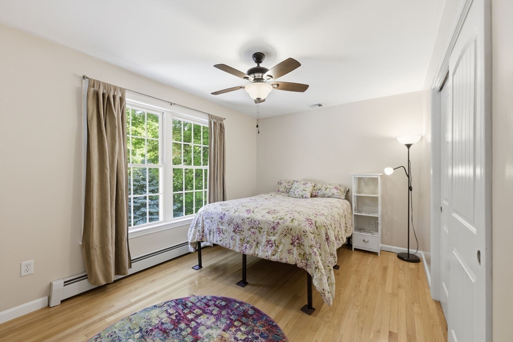 345 Bragg Road Warren, MA 01585 - Photo 27 of 41 a bedroom with a bed and a window