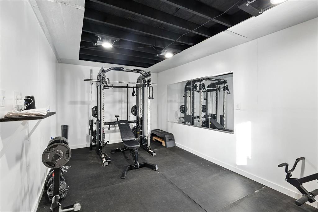 11005 Cowboy Lane Flower Mound, TX 76262 - Photo 12 of 14 a view of a room with gym equipment