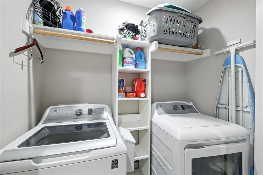 11005 Cowboy Lane Flower Mound, TX 76262 - Photo 13 of 14 a utility room with dryer and washer