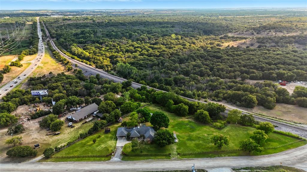 11005 Cowboy Lane Flower Mound, TX 76262 - Photo 4 of 14 a view of a lake with a mountain