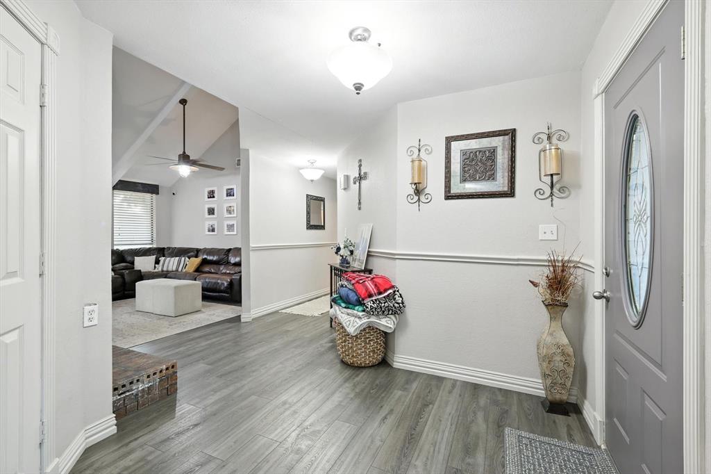 11005 Cowboy Lane Flower Mound, TX 76262 - Photo 9 of 14 a living room with furniture and a wooden floor