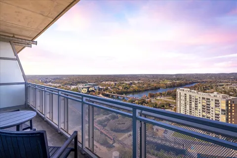 a view of city and roof deck