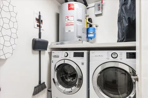 a view of livingroom with washer and dryer