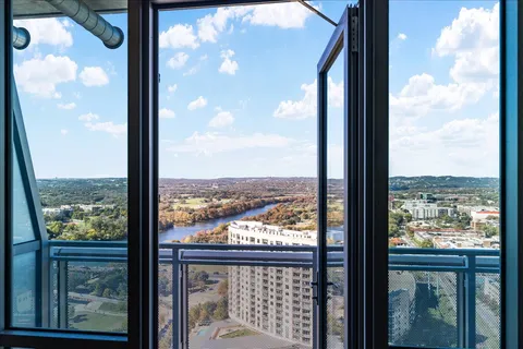 a view of a glass door from a balcony