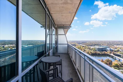 a view of a balcony with an ocean view
