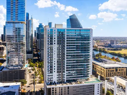 a view of a city with tall buildings