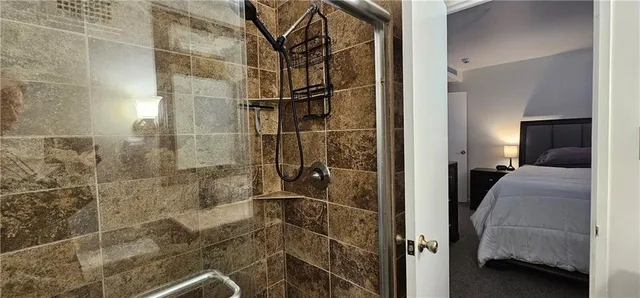 a en suite bathroom with a shower