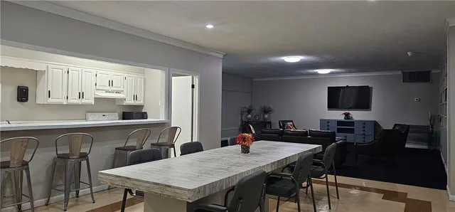 a view of a dining room with furniture