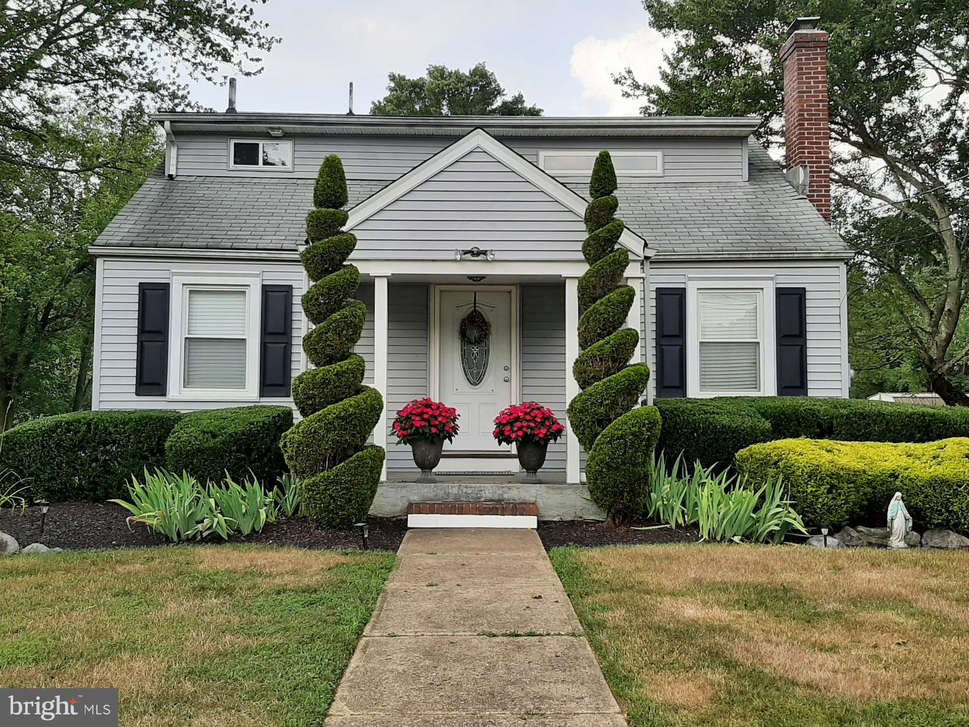 643 Etra Road East Windsor, NJ 08520 - Photo 1 of 26 a front view of a house with garden