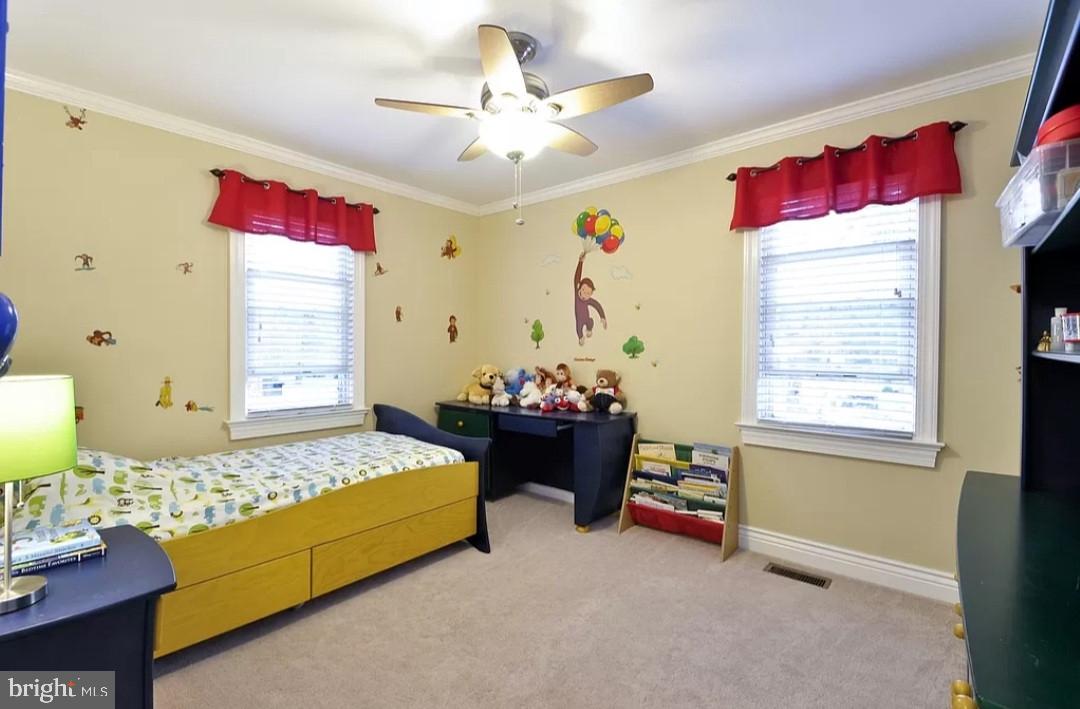 643 Etra Road East Windsor, NJ 08520 - Photo 18 of 26 a bed room with a bed and a couch