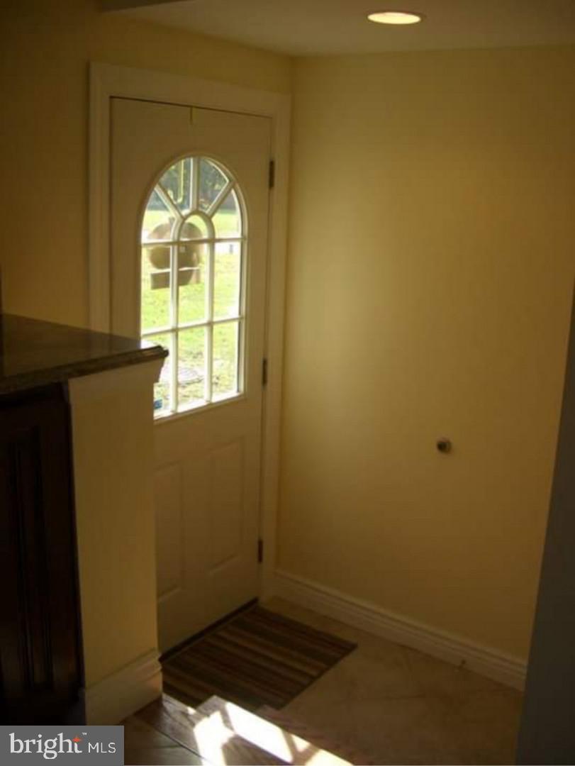 643 Etra Road East Windsor, NJ 08520 - Photo 7 of 26 a view of empty room with window