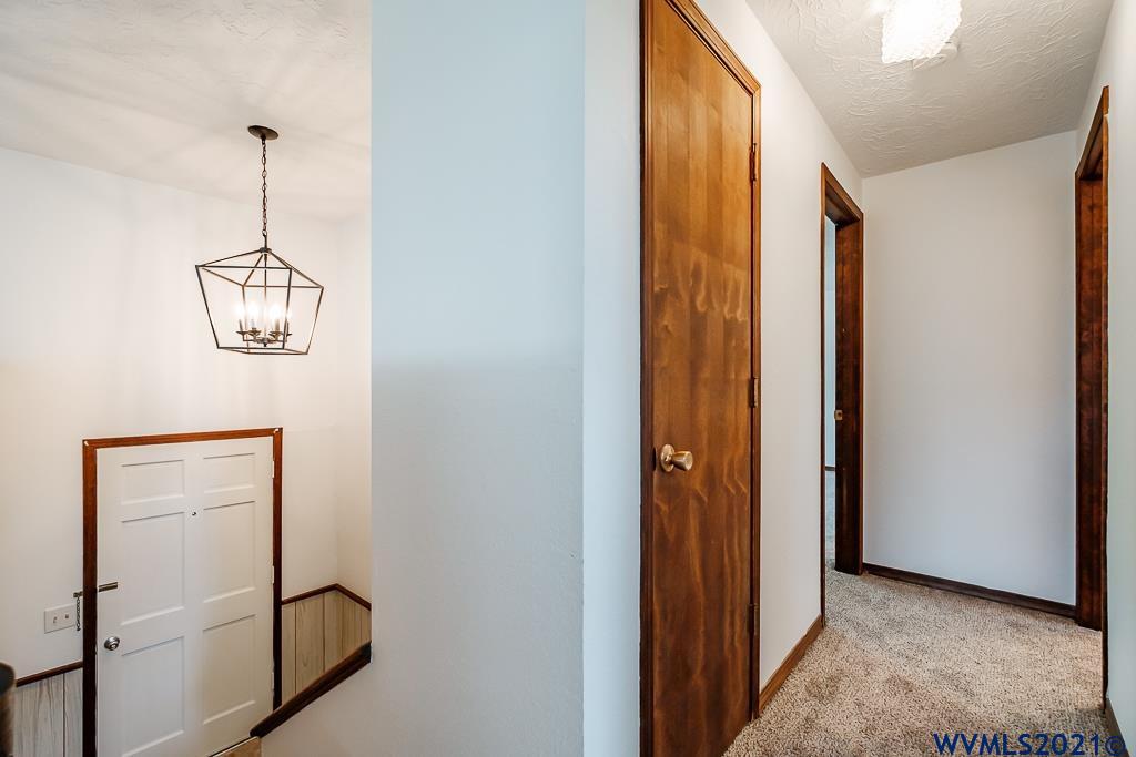 1278 Southwest Maple Street Dallas, OR 97338 - Photo 7 of 42 a view of a hallway with closet