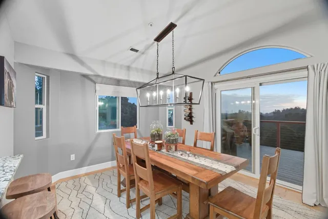 a kitchen with a sink cabinets stainless steel appliances and a counter top space