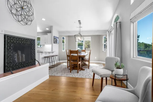 a kitchen with stainless steel appliances a refrigerator and a stove top oven
