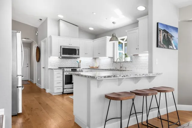 a room with furniture and a dresser