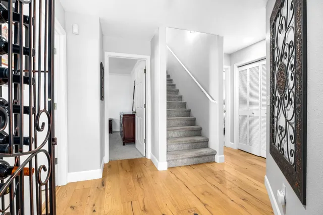 a bedroom with a bed and a walk in closet