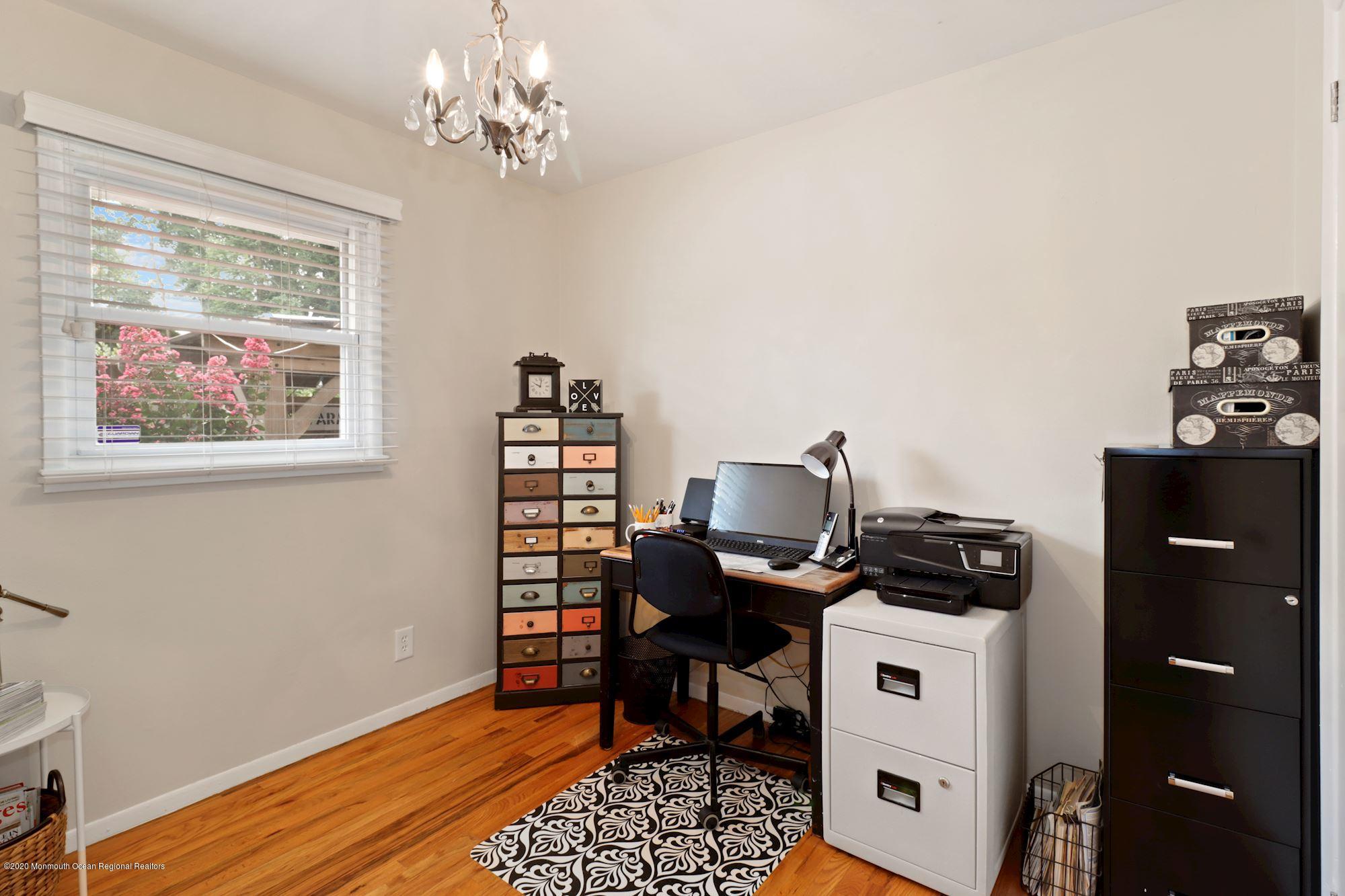 30 Wickatunk Road Manalapan, NJ 07726 - Photo 17 of 31 a view of a workspace with furniture and a window