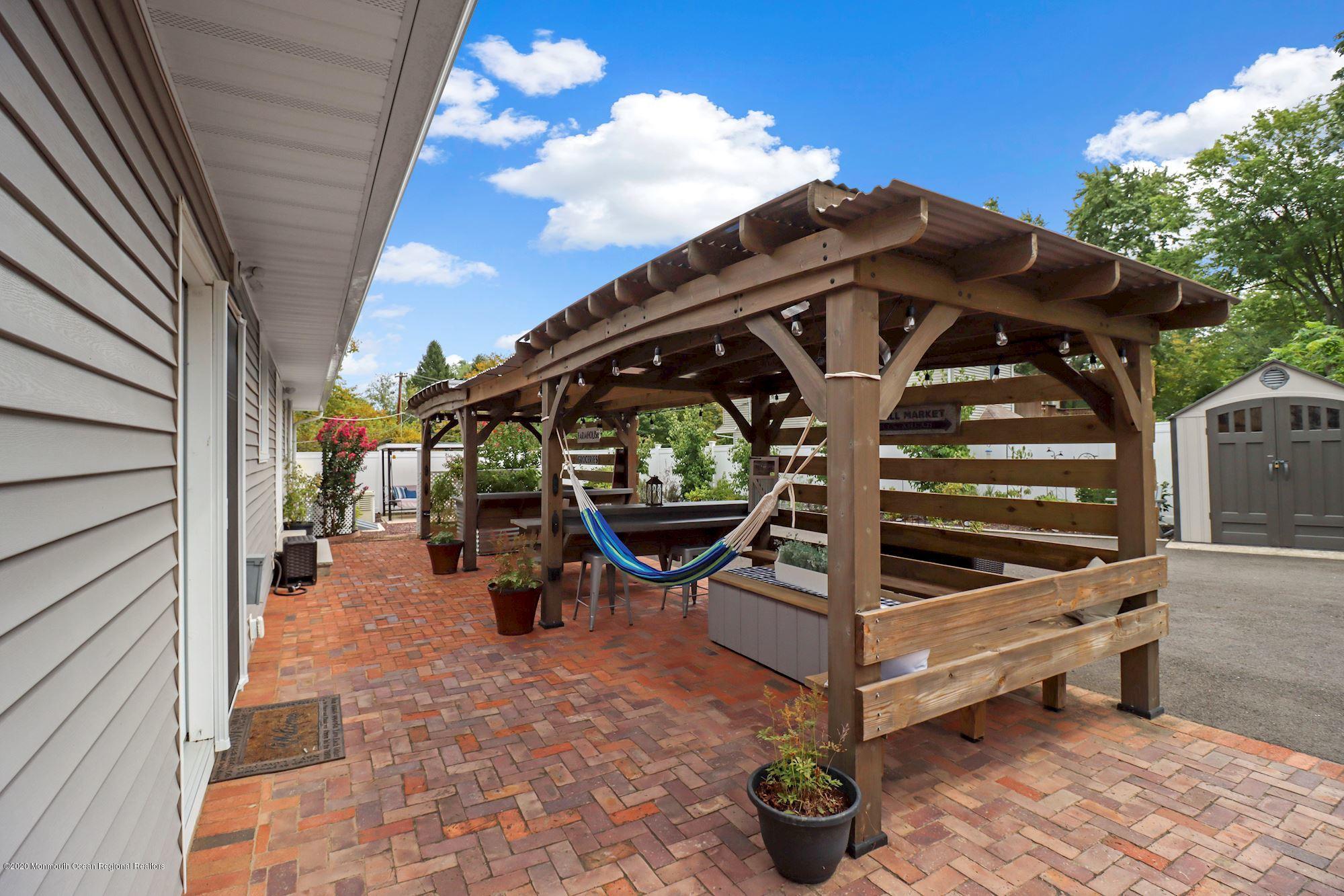 30 Wickatunk Road Manalapan, NJ 07726 - Photo 23 of 31 a view of outdoor seating space