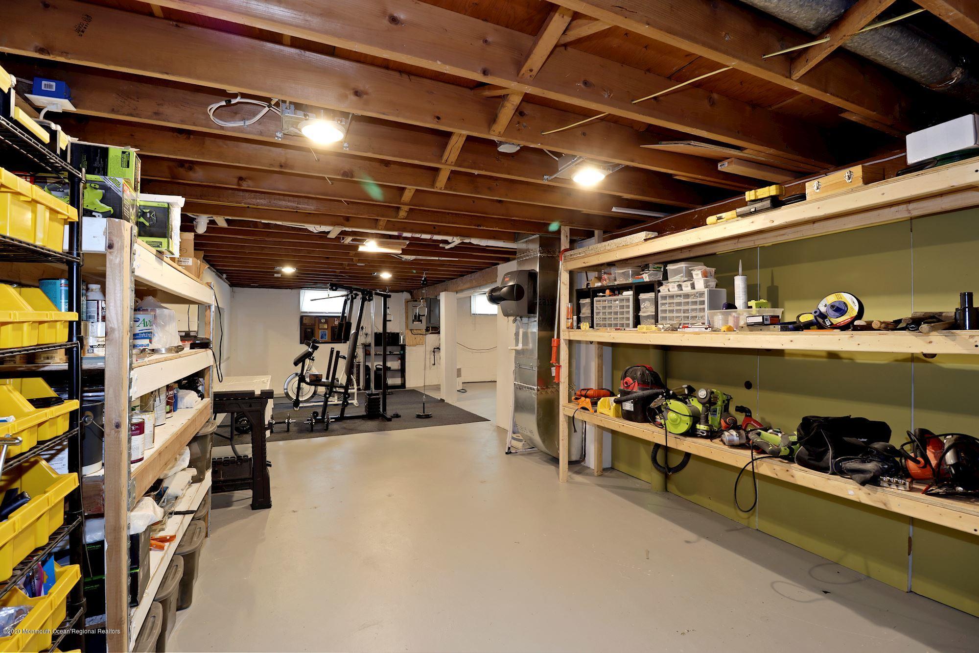 30 Wickatunk Road Manalapan, NJ 07726 - Photo 29 of 31 a view of a storage room with racks