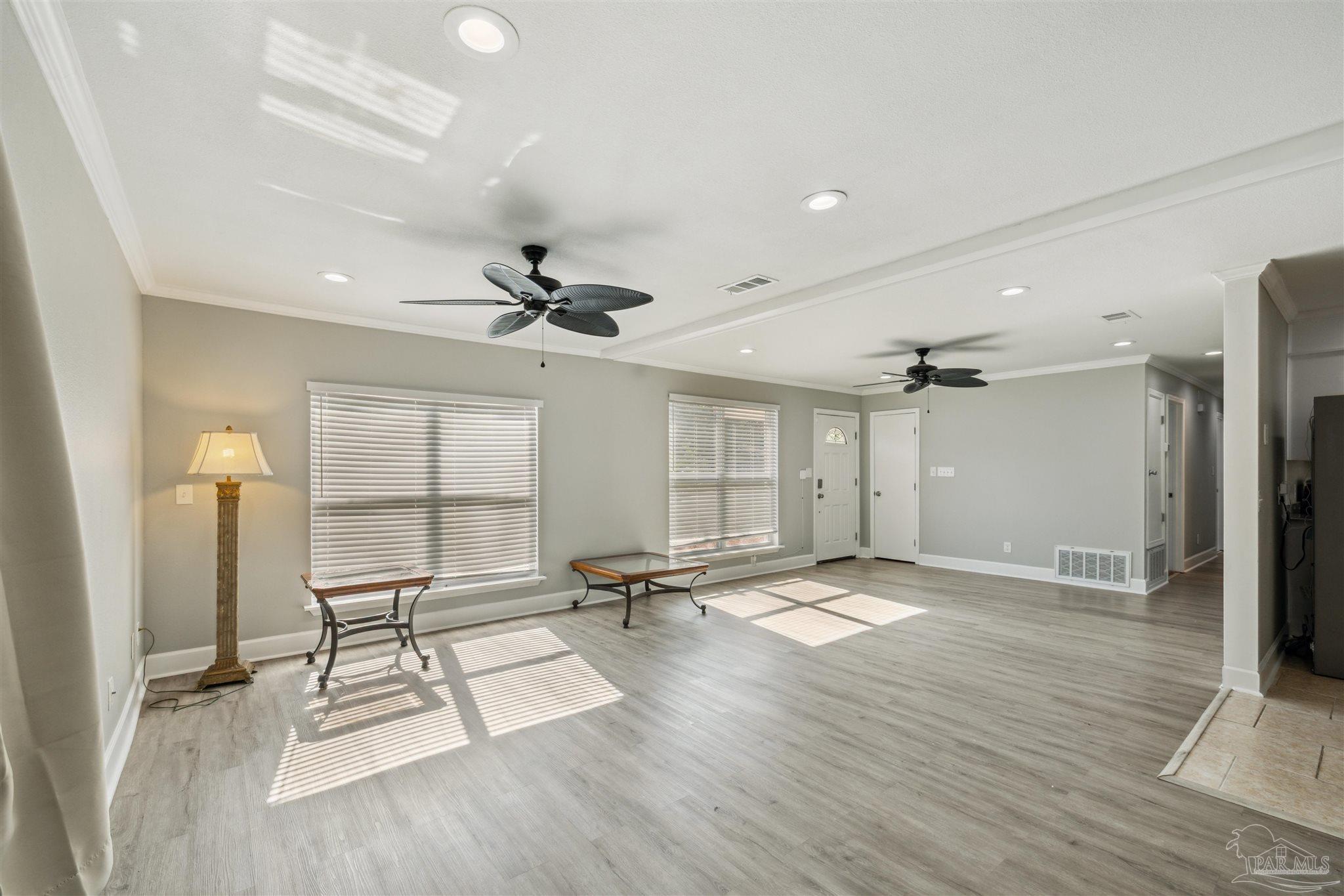 4250 Avenida San Marcus Pace, FL 32571 - Photo 9 of 23 a view of an empty room with a window