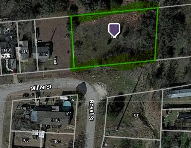 a view of a house with a street