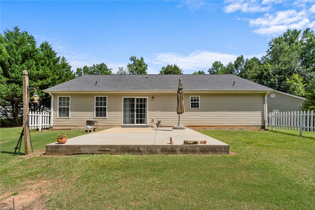 167 Mediterranean Avenue Anderson, SC 29621 - Photo 29 of 33 A spacious backyard patio awaits, perfect for outdoor living and entertaining.