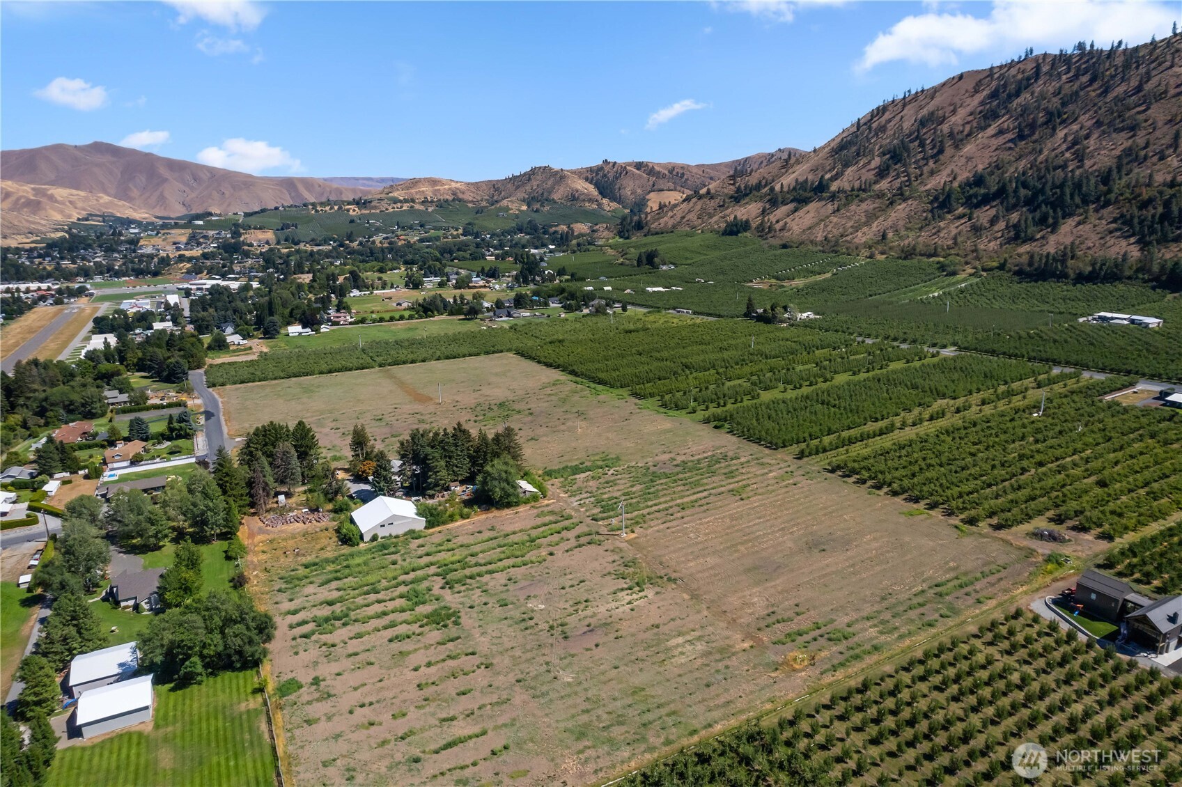 0 Wohlers Road Cashmere, WA 98815 - Photo 5 of 15 a view of a lake with a mountain in the background