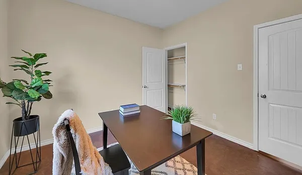 a view of a workspace with furniture