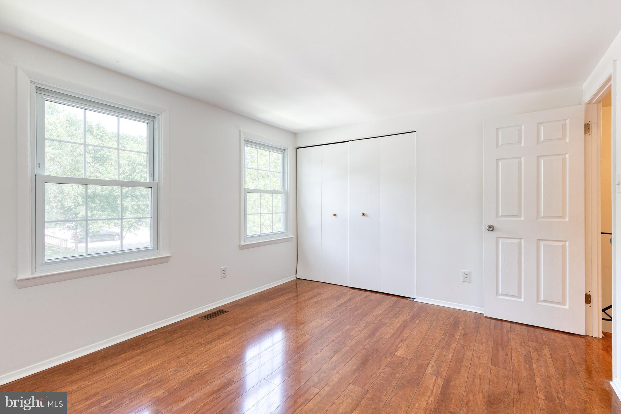 3429 Saluda Road Nottingham, MD 21236 - Photo 24 of 37 an empty room with wooden floor and windows