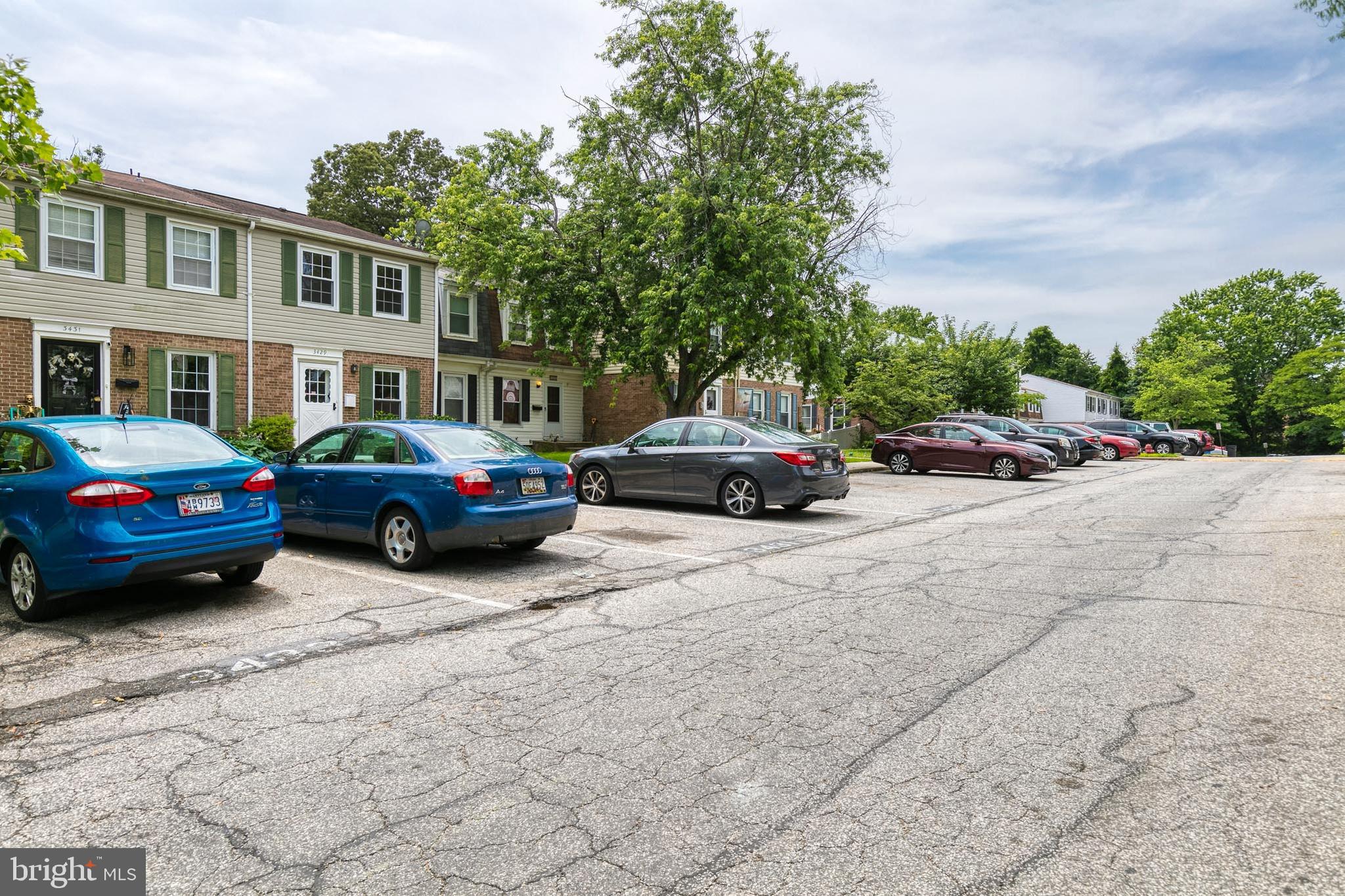 3429 Saluda Road Nottingham, MD 21236 - Photo 3 of 37 a view of cars parked in front of a building