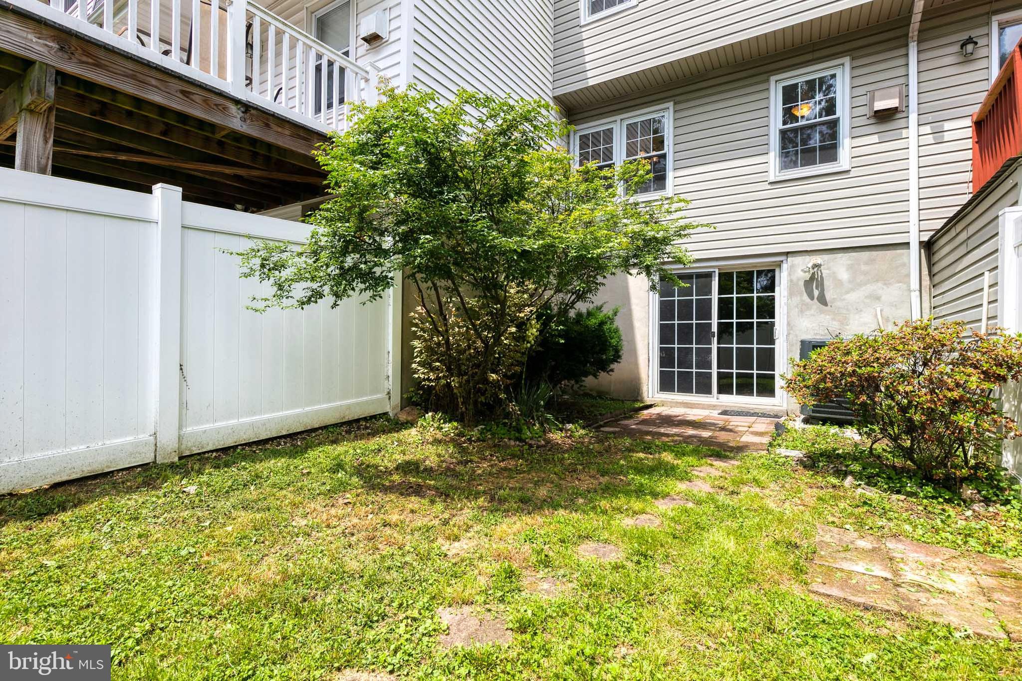 3429 Saluda Road Nottingham, MD 21236 - Photo 34 of 37 a view of a backyard with plants and large tree