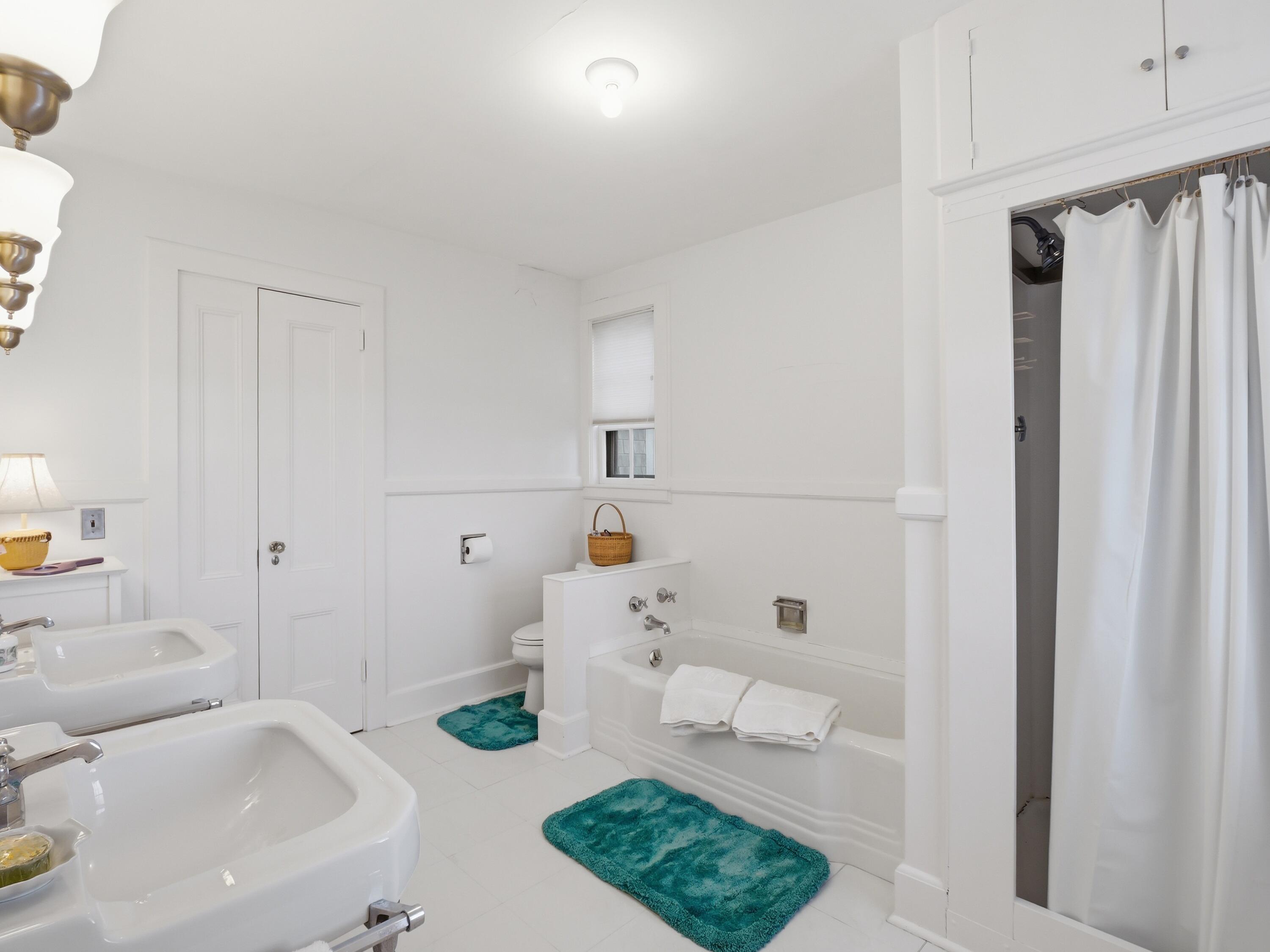 190 Vineyard Road Cotuit, MA 02635 - Photo 26 of 41 a bathroom with a sink and a mirror