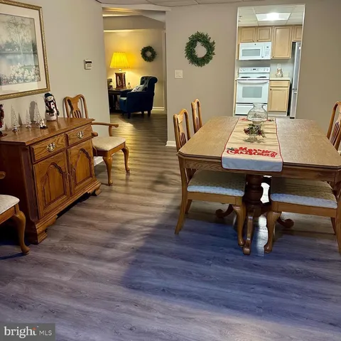 a bedroom with a bed and a mirror