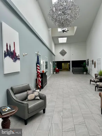 a room with furniture and a wooden floor