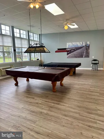 a view of swimming pool with a yard