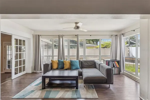 a living room with furniture and a window