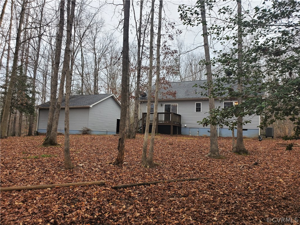443 Lazy Acres Road Bumpass, VA 23024 - Photo 15 of 19 a house view with a backyard space