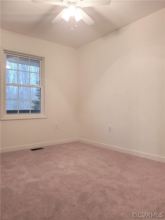 443 Lazy Acres Road Bumpass, VA 23024 - Photo 10 of 19 an empty room with a window